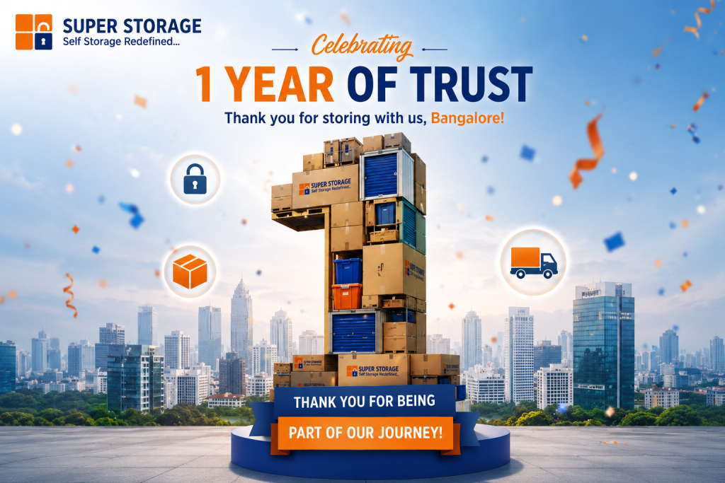 A large number "1" constructed from storage boxes and units on a podium, celebrating one year of service in Bangalore.
