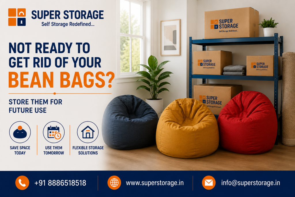 A promotional banner for Super Storage highlighting casual furniture storage, depicting three colorful bean bags—navy blue, mustard yellow, and bright red—sitting on a wooden floor in a brightly lit room next to metal shelving units stocked with Super Storage cardboard boxes, accompanied by the headline "Not Ready To Get Rid Of Your Bean Bags? Store Them For Future Use", service icons for "Save Space Today", "Use Them Tomorrow", and "Flexible Storage Solutions", with contact details at the bottom.