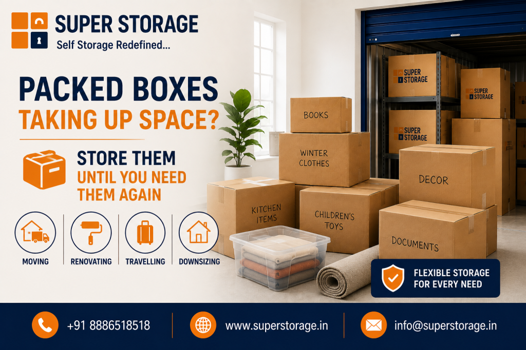 A promotional banner for Super Storage highlighting box storage solutions, depicting an array of labeled cardboard boxes ("Books", "Winter Clothes", "Kitchen Items", "Children's Toys", "Decor", "Documents"), a clear plastic container of folded blankets, and a rolled rug in front of an open self-storage unit stocked with Super Storage boxes on metal shelving, accompanied by the headline "Packed Boxes Taking Up Space? Store Them Until You Need Them Again", use-case icons for "Moving", "Renovating", "Travelling", and "Downsizing", with a badge for "Flexible Storage For Every Need" and contact details at the bottom.