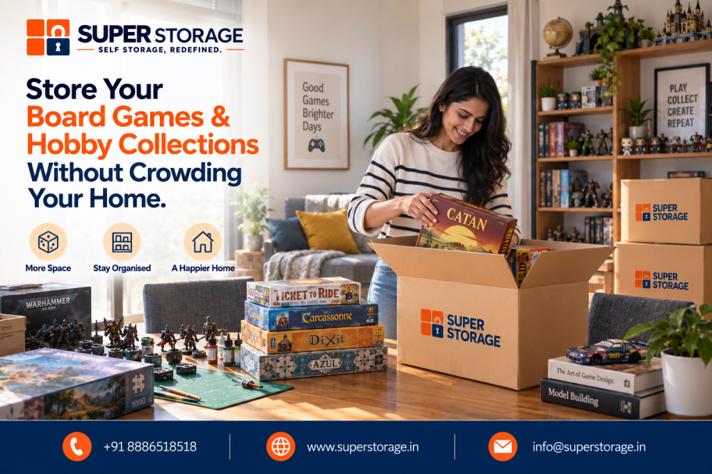 A promotional banner for Super Storage highlighting tabletop board game and hobby collection storage, showing a smiling young woman packing board games like Catan into a branded Super Storage box on a dining table covered with hobby gear including painted tabletop miniatures, craft paints, model cars, and game boxes like Ticket to Ride, Carcassonne, Dixit, and Azul, with a tall display shelf of figurines and collectibles in the background beside stacked Super Storage boxes and framed prints reading "Good Games Brighter Days" and "PLAY COLLECT CREATE REPEAT", accompanied by the headline "Store Your Board Games & Hobby Collections Without Crowding Your Home.", feature icons for "More Space", "Stay Organised", and "A Happier Home", and Super Storage contact details across the bottom banner.